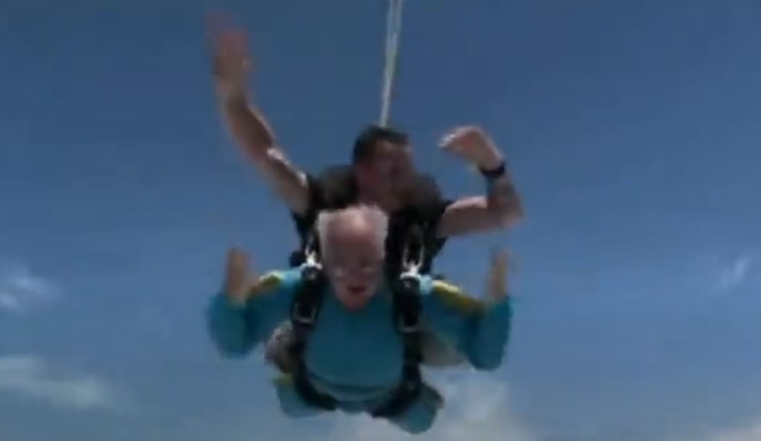 Pat Byrne, Donka board member, in free fall with his sky diving instructor