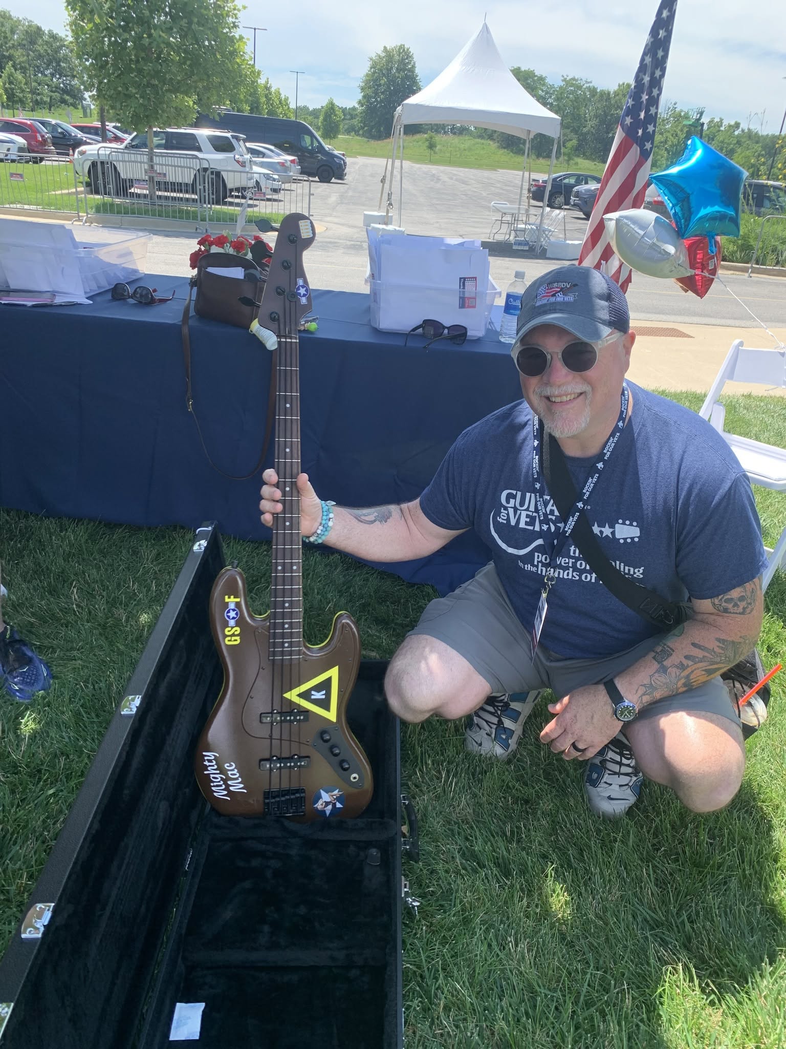 Bill from Guitars for Vets showing the special guitar he made