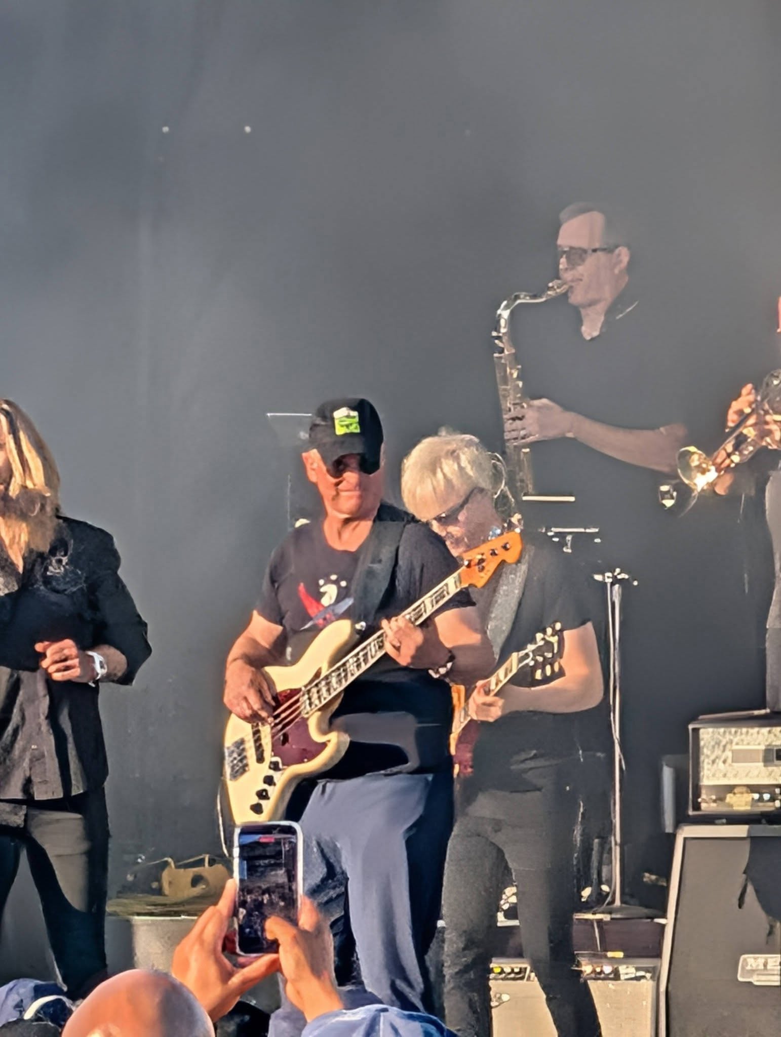 man playing guitar on stage
